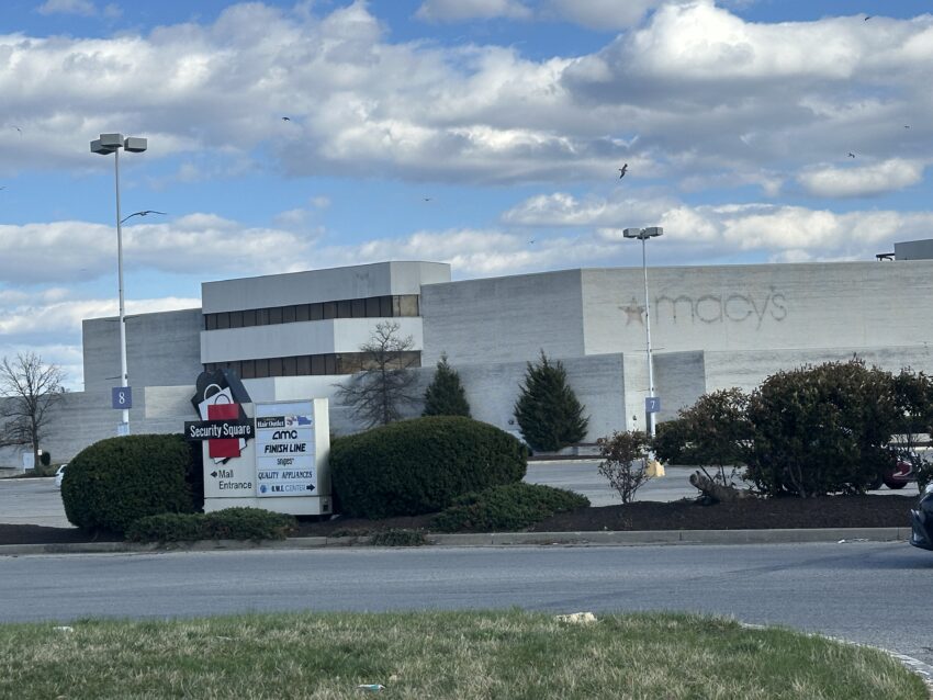 Exterior view of a hospital with clear skies.
